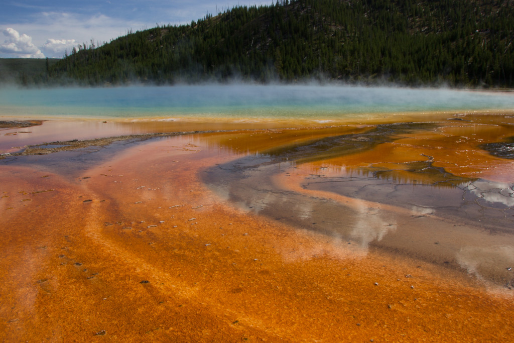 The Grand Prismatic Spring - it's very hot and the orange stuff are bacteria